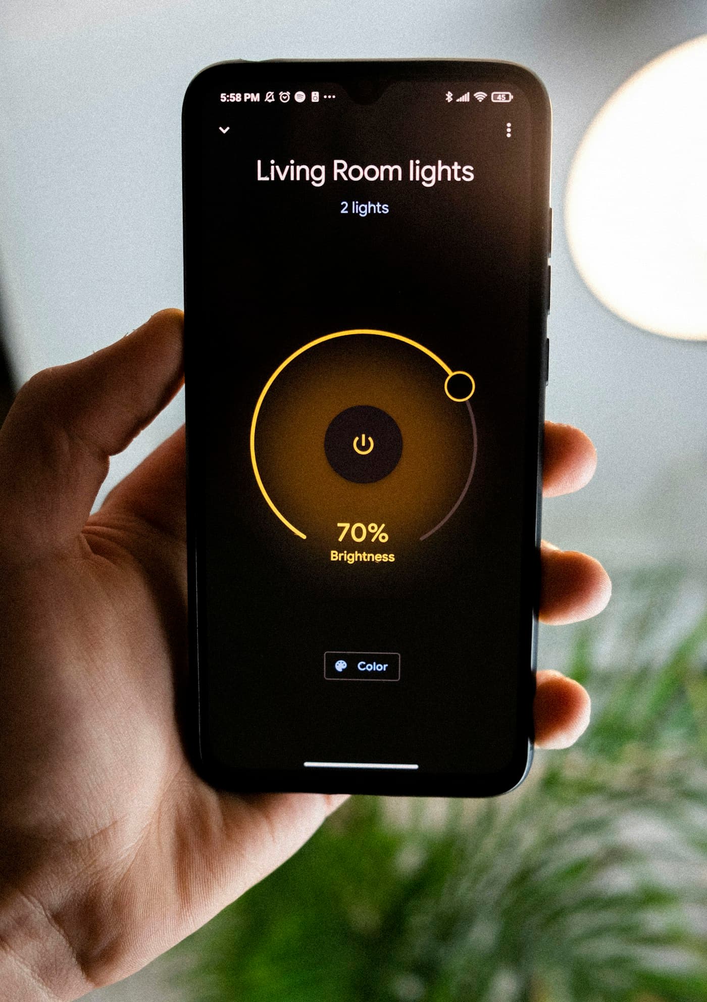 Phone showing a smart thermostat app